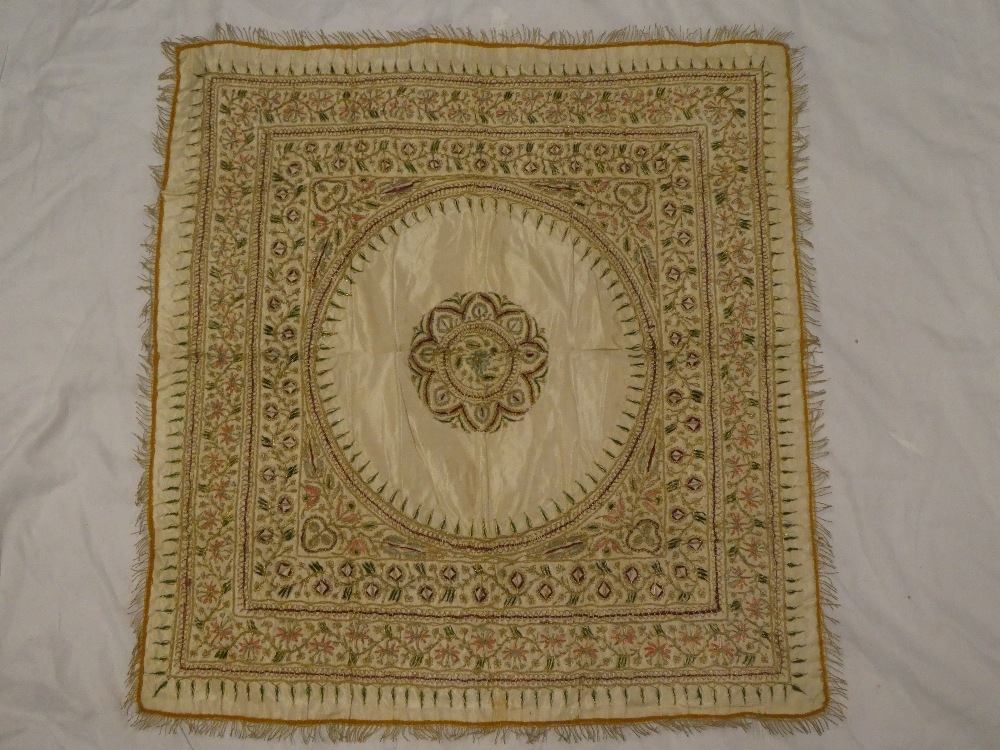 An Indian embroidered silk and wirework square panel with floral and geometric decoration,