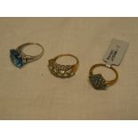 A 9ct gold dress ring set blue stones and diamond chips,