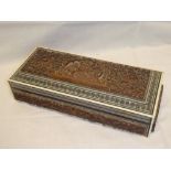 An Eastern carved sandalwood rectangular table box with figure decoration and geometric inlaid