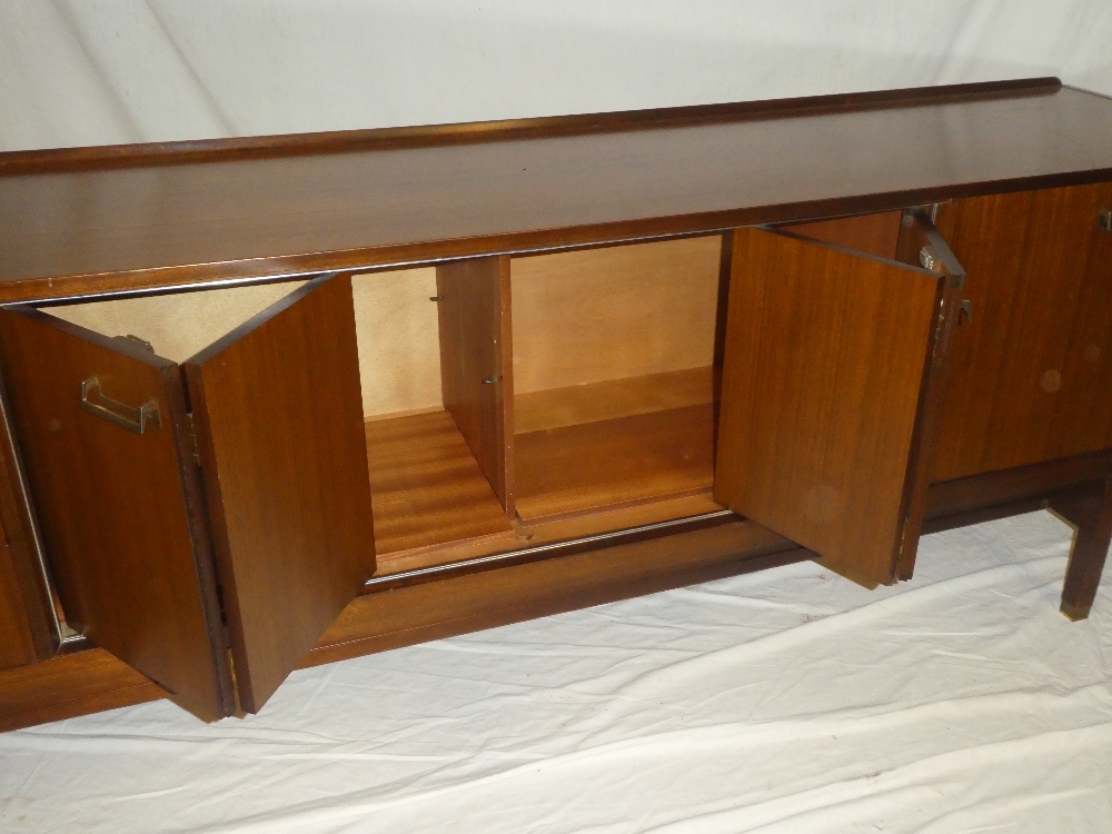 A 1960s G-Plan teak sideboard by EG Gomme with central cupboard enclosed by two folding doors - Image 2 of 4