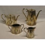 A good quality silver-plated four-piece tea and coffee set comprising tapered coffee pot with