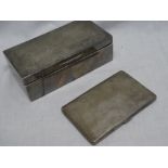 A George VI silver rectangular cigarette box with hinged lid,