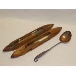A pair of old German wooden weaving shuttles and a 19th Century copper ladle with iron handle