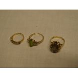Three various 9ct gold dress rings including large dress ring set smoky quartz,