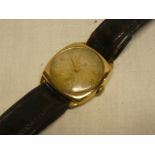 A gentleman's 9ct gold wrist watch by Avia with silvered dial and leather strap