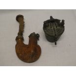 An unusual Continental carved wood smoker's pipe with figure and landscape decoration and a bronze