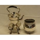 An electroplated circular spirit kettle and stand with burner and a silver-plated oval ornamental