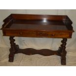 A mid 19th Century mahogany rectangular wash stand/side table with two drawers in the frieze,
