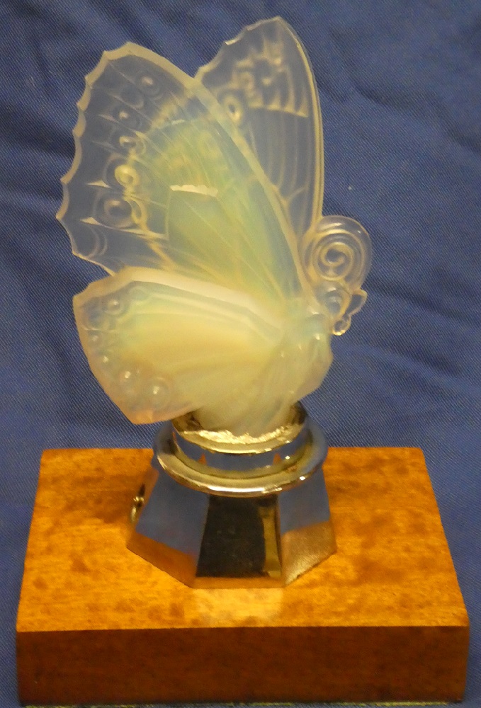 A good quality Sabino glass opaline car mascot in the form of a butterfly on chromium plated