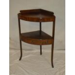 A 19th century inlaid mahogany corner washstand with a small drawer in the frieze on square legs