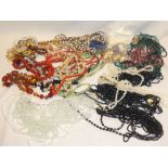 A large selection of various costume jewellery including necklaces, earrings etc.