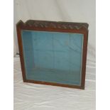 An old stained wood rectangular glazed display case,