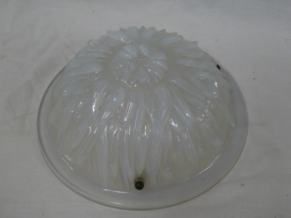 A Continental opaline glass circular inverted dome ceiling shade with sunflower decoration,
