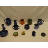 A selection of C H Brannam of Barnstaple Pottery including jugs, small vases, bowls etc.