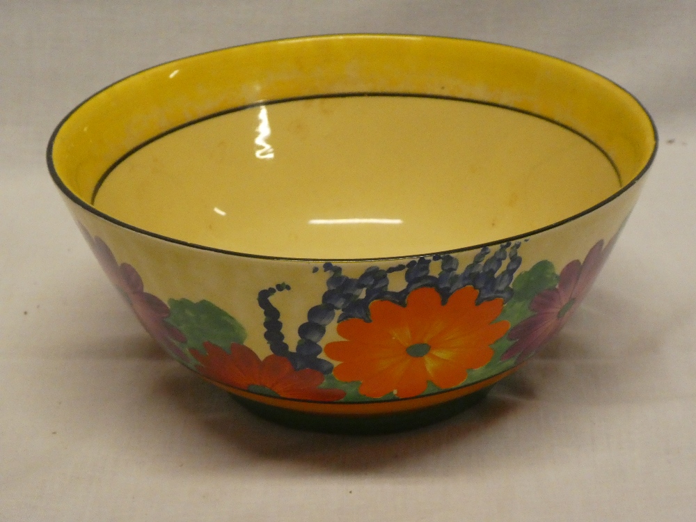 A Clarice Cliff Bizarre "Gayday" pattern circular bowl with painted floral decoration,