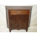 A 1930's oak side cabinet with canted sides,