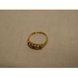 A Victorian 18ct gold dress ring set two diamonds and three rubies