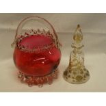 A good quality cranberry tinted glass basket-shaped bowl with spiral twist handle and a cut glass