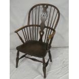 A 19th century elm and ash Windsor style armchair with pierced splat and spindle back,