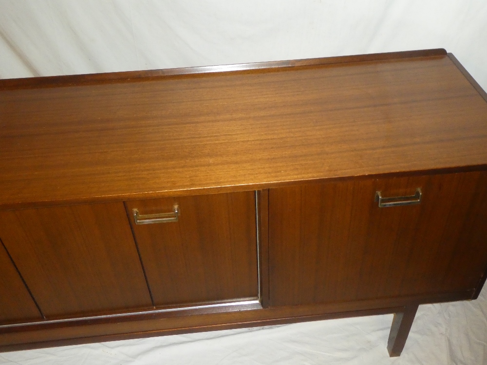 A 1960s G-Plan teak sideboard by EG Gomme with central cupboard enclosed by two folding doors - Image 4 of 4