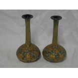 A pair of Royal Doulton pottery tapered spill vases with gilt and blue glazed decoration,