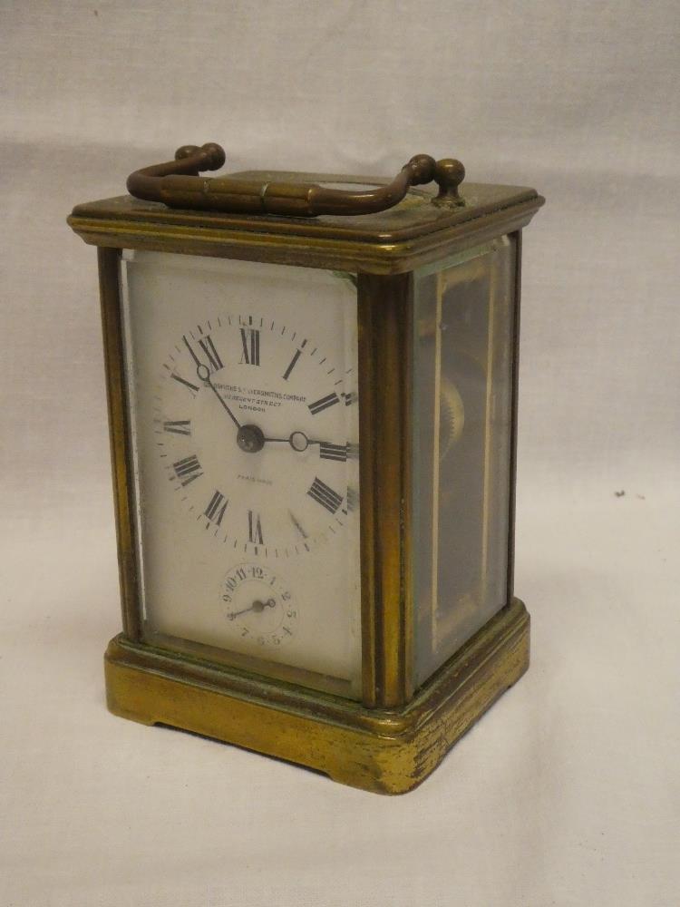A good quality carriage clock with rectangular enamelled dial by the Goldsmiths and Silversmith