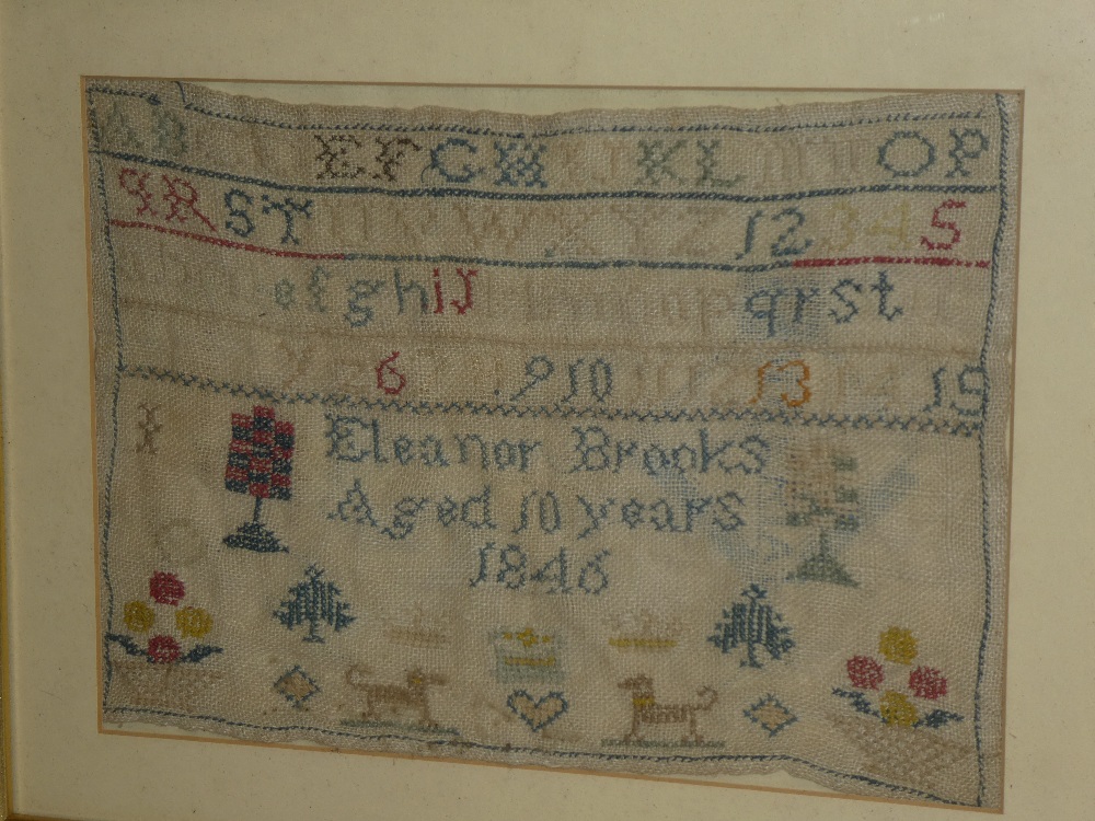 An early Victorian rectangular needlework sampler by Eleanor Brooks aged 10 years 1846 depicting