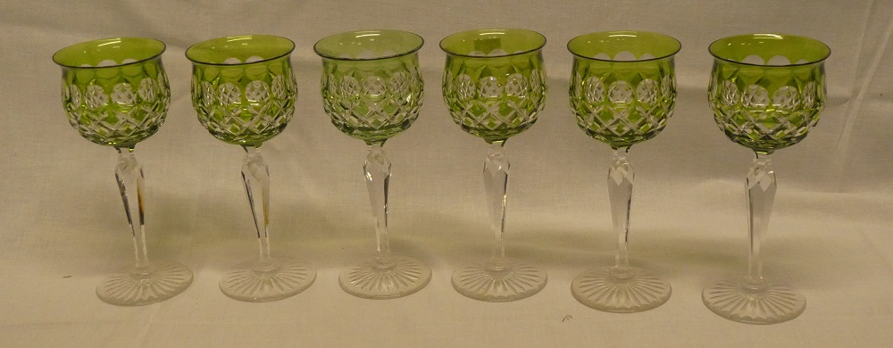 A set of six good quality green tinted cut glass hock goblets