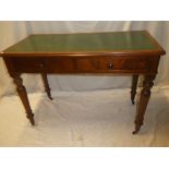 A Victorian mahogany rectangular writing table with inset leather writing surface,