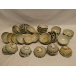 A selection of approximately 40 18th Century Chinese Nanking Cargo circular tea bowls