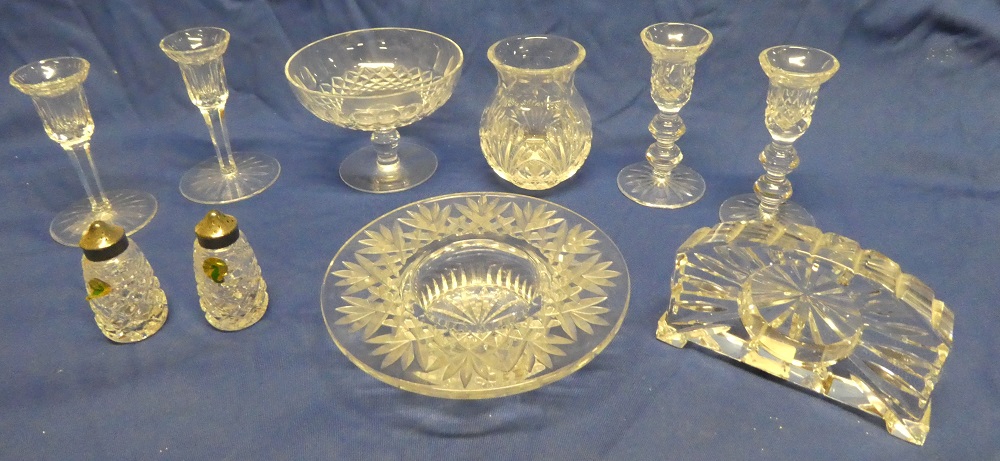 Ten pieces of Waterford cut crystal glass including two pairs of candlesticks, pedestal bowl,