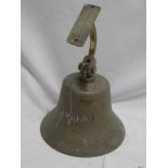 A copy brass ship's bell marked "Maverick"