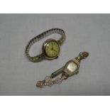 A ladies 9ct gold wrist watch by Bentima with plated strap and one other ladies 9ct gold wrist