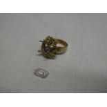 A modern 18ct gold dress ring with ornate mount (af)