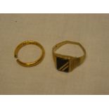 A 22ct gold wedding band (cut) and a gentlemans 9ct gold signet-style ring (2)