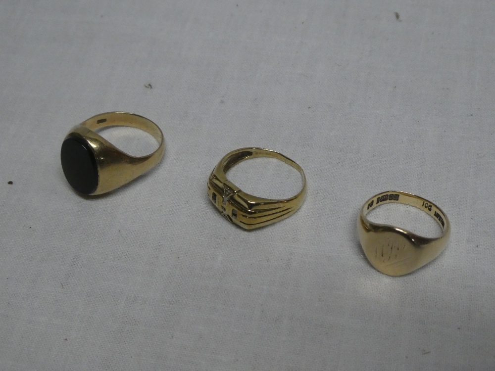 Three various 9ct gold signet style rings,