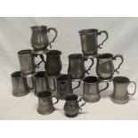 A selection of thirteen various 18th and 19th century pewter tankards,