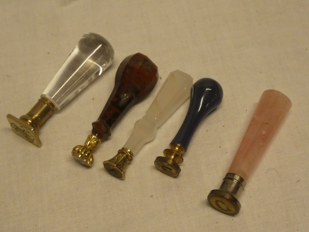 Five various old brass hand seals with semi-precious stone handles