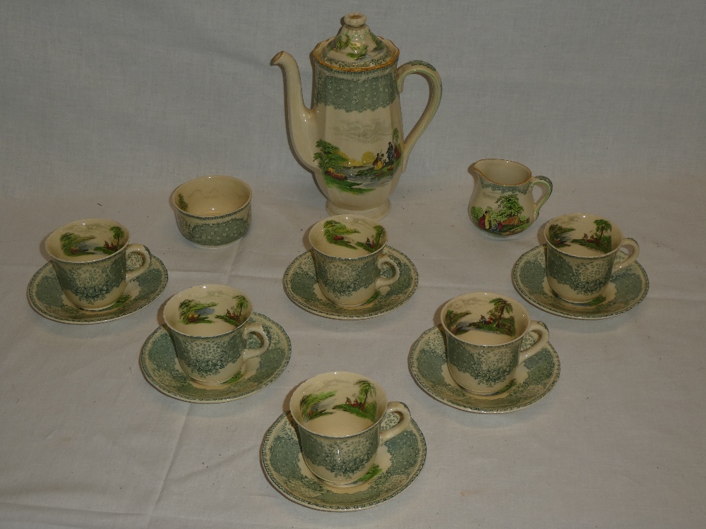 A Royal Doulton china coffee set with figures in a landscape decoration comprising coffee pot,