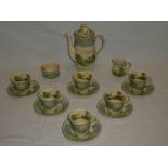 A Royal Doulton china coffee set with figures in a landscape decoration comprising coffee pot,