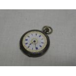 A ladies Continental silver fob watch with circular enameled dial in engraved case