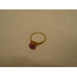 A 10ct gold dress ring set a pink stone