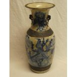 A late 19th Century Japanese pottery tapered vase with painted blue and white bird and floral