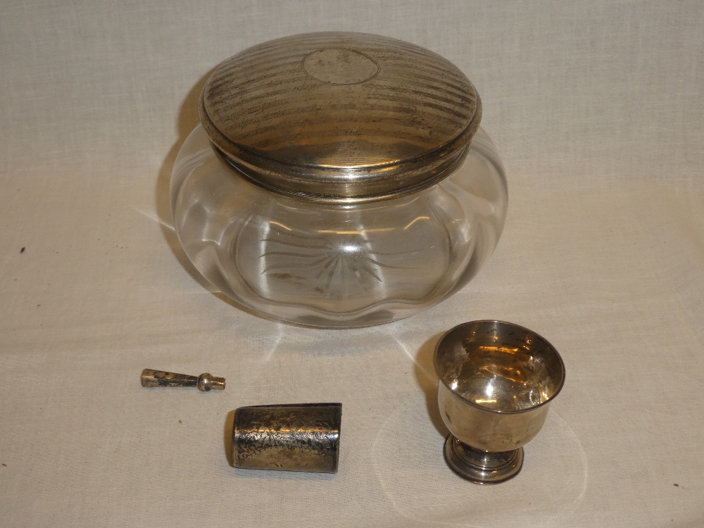 A large George V glass dressing jar with silver circular lid,