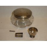 A large George V glass dressing jar with silver circular lid,