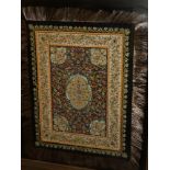 An Indian embroidered wire and silk rectangular panel mounted with various semi precious stones and