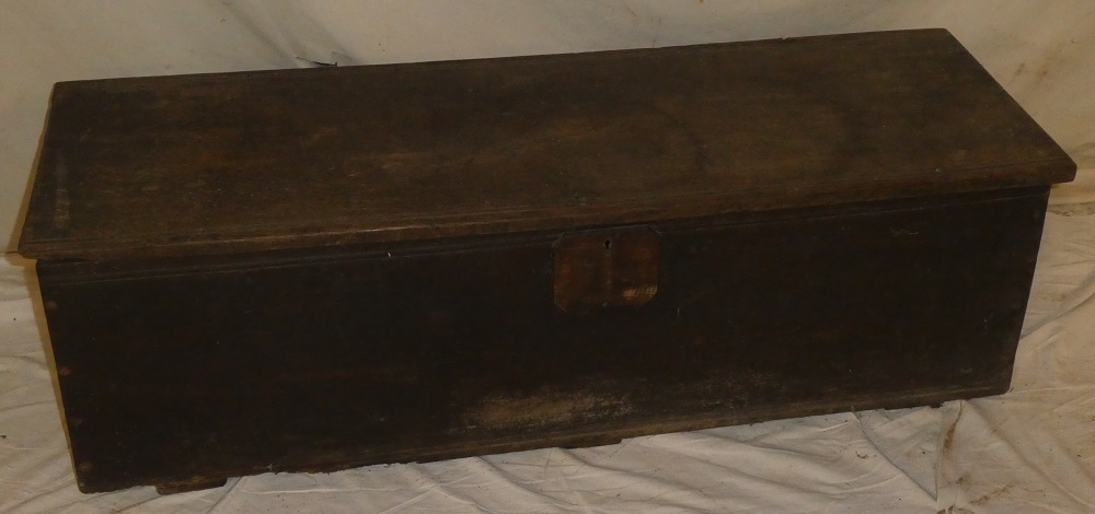 An early 19th Century oak rectangular trunk with hinged lid,