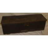 An early 19th Century oak rectangular trunk with hinged lid,