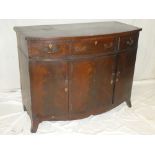 A 19th Century mahogany bow front side cabinet with three drawers in the frieze and cupboard