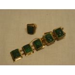 An 18ct gold bracelet mounted with seven rectangular panels of malachite portraits and a matching